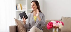 Women in living room with tablet