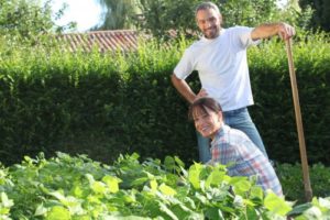 husband and wife in garden
