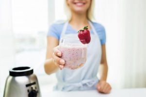 Women Serving Strawberry Drink
